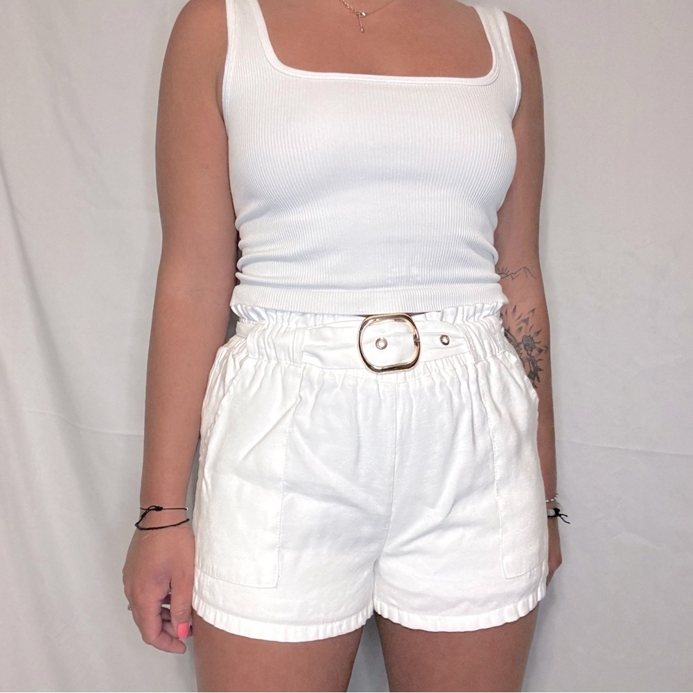 White kittenish xs shorts with belt.